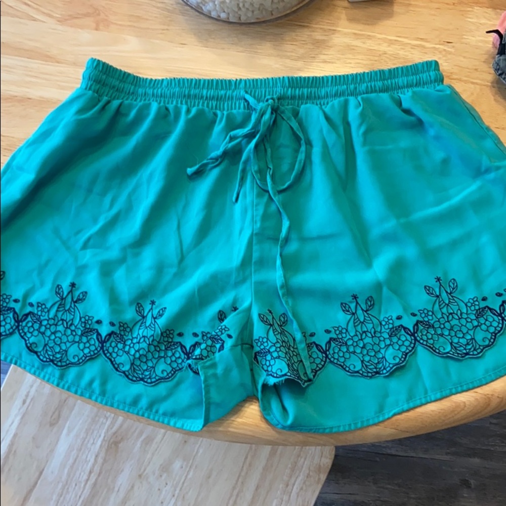 Blue fabric shorts with embroidery